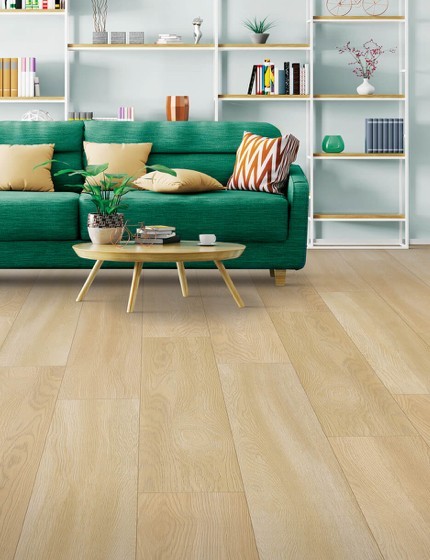 Green couch on Laminate floor | Georgia Flooring