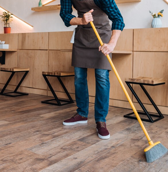 Sweeping hardwood floor | Georgia Flooring
